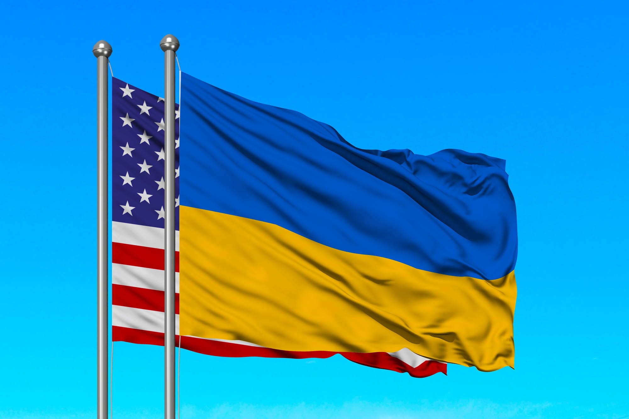 Image of Ukraine and U.S. flag in the wind.